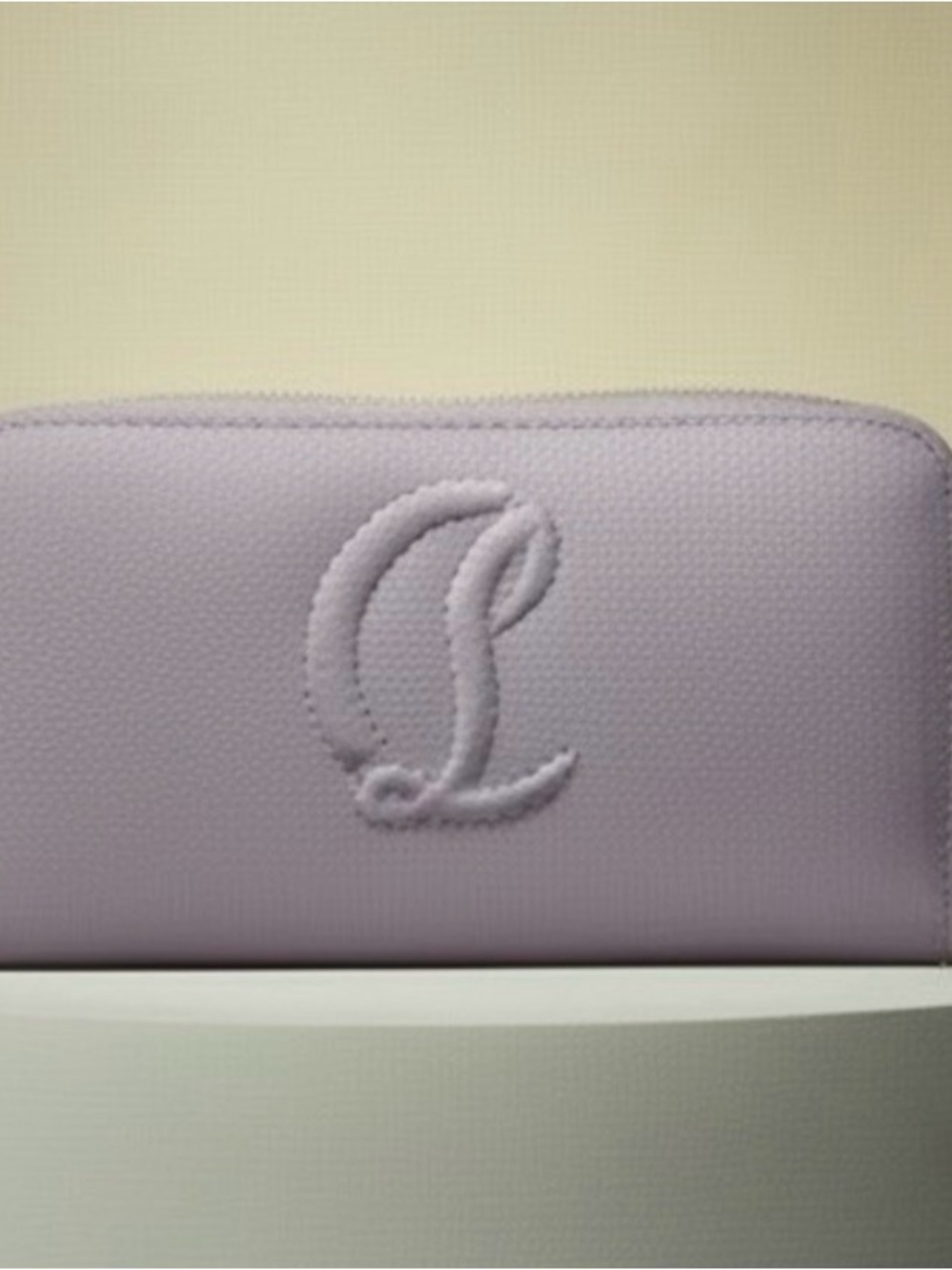Lilac zip wallet with red interior